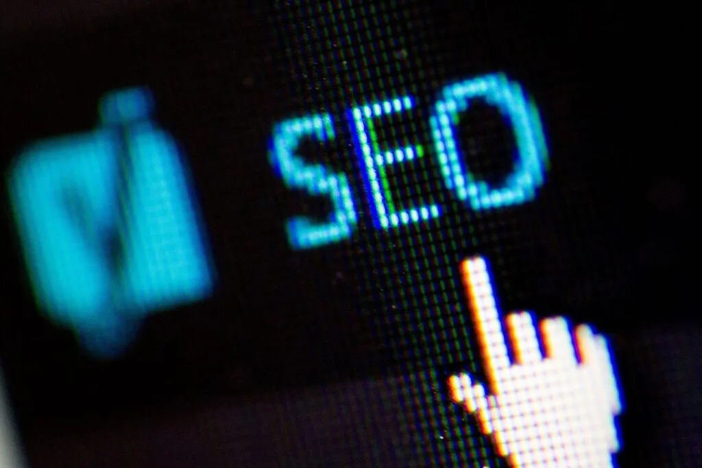 Mouse pointer hovering over an SEO icon