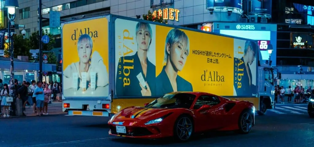 truck with advertisement in yellow background