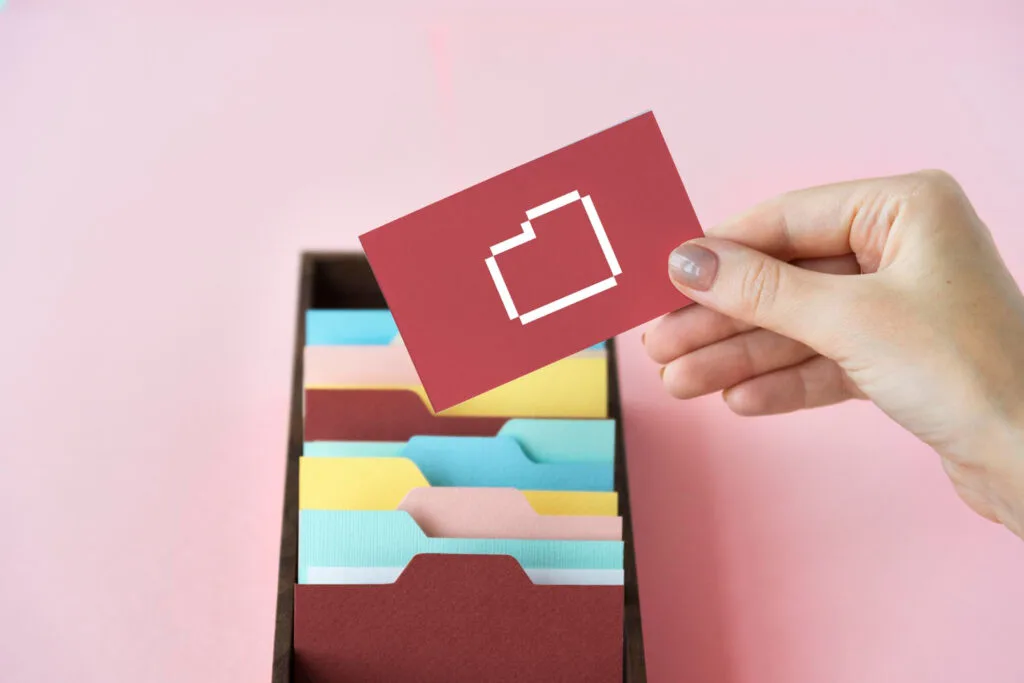 hand holding an email attachment card